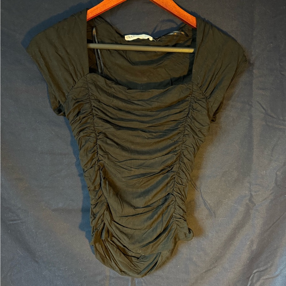 Synched side, modest or office wear, high on chest